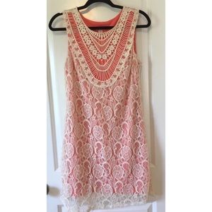 Lace overlay peach dress.